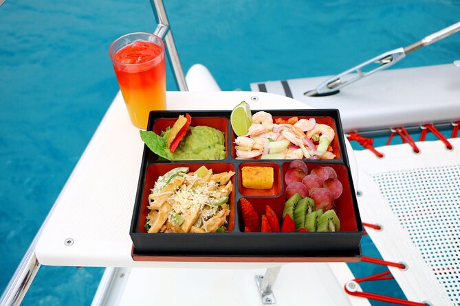 Half-Day Luxury Sailing Experience in Tulum with Open Bar - Lunch on the water: how the meal fits into a half-day plan