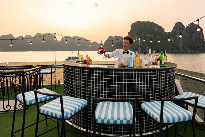 Halong Bay Day Tour With Sunlight Luxury Cruise With Transfer - The Ship Experience: Sundeck, Jacuzzi Pool, and Sunset Party