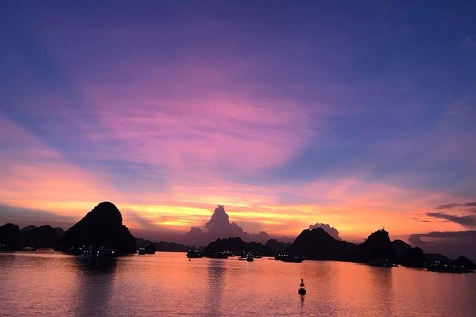 Halong Bay Full Day with Kayaking, Hiking viewpoint, Cave - Deluxe To Luxury - Sung Sot Cave and Titop Island: Stairs, Sun, and Panoramic Payoff