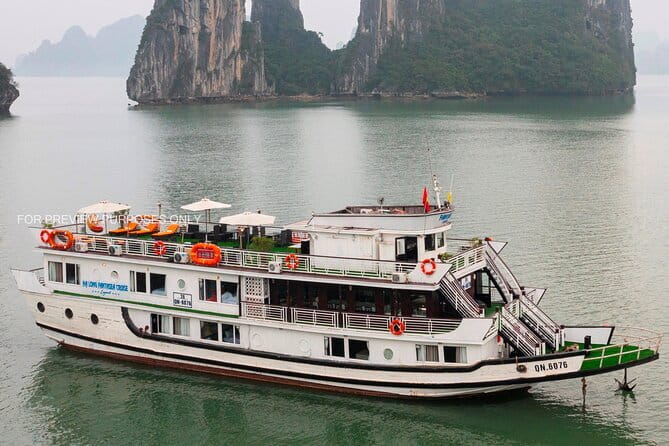 HALONG BAY LUXURY IRIS CRUISE DAY TRIP-BEST SELLER: Kayak, Music - Titop Island at 14:45: Beach Time or the Climb