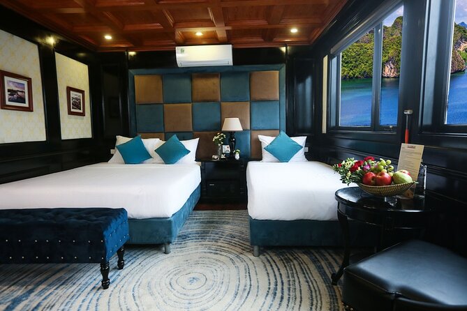 Halong Milalux 5 Star Cruise 2d1n,All inclusive,transfer - Day 2: Titop Island early morning, Tai Chi on deck, then back to Hanoi