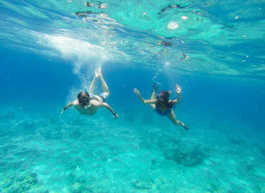 Heraklion Luxury Catamaran Dia Isla -Gourmet Lunch Top Rated - Dia Island in the water: snorkeling, swimming, SUP, and fishing