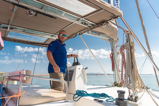 Hersonissos: Luxury Sunset Catamaran Cruise Sushi & Open Bar - The Agios Georgios Sarantáris Stop: Photos, Swimming, and Sunset Positioning