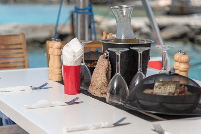 Hersonissos: Luxury Sunset Catamaran Cruise Sushi & Open Bar - Water Time Options: SUP, Snorkeling Gear, Noodles, and Fishing