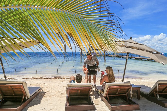 Isla Mujeres luxury catamaran with premium open bar and lunch - On board the catamaran: drinks, snacks, and how the crew manages the crowd