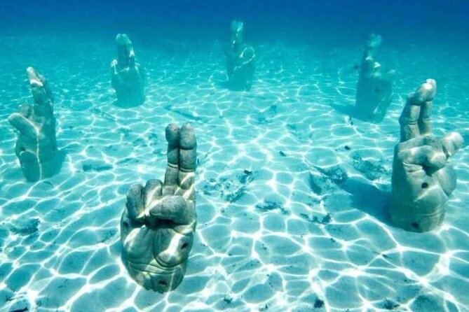 Isla Mujeres on luxury catamaran with snorkel, open bar and lunch - Group size, schedule, and why the timing works out