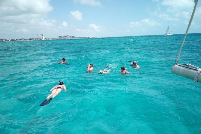 Isla Mujeres Premium Catamaran Tour with transportation from Playa del Carmen - Where you meet and what to look for at the marina
