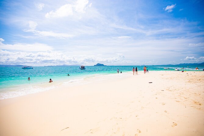 Khai Islands Snorkeling Premium Trip From Phuket - Crowds, deckchairs, and the money reality on the beach