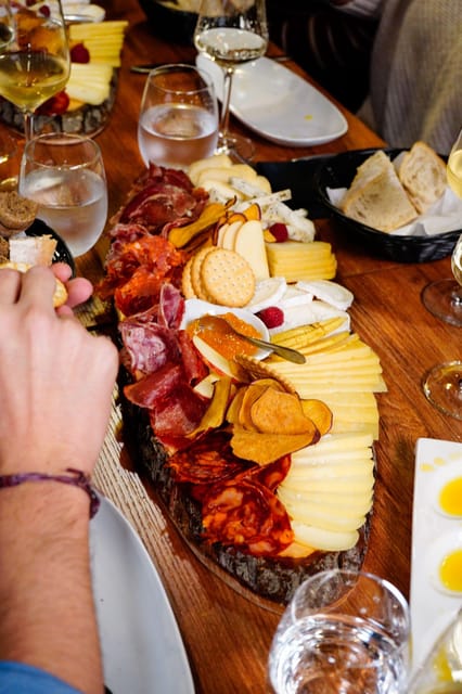 Lisbon: Premium Wine and Tapas Tasting Session - Cheese, Iberian sausages, and jam: the food pairing is the main event too
