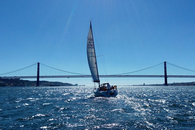 Lisbon Sailing Tour on a Luxury Sailing Yacht with 2 Drinks - Safety briefing first, then real storytelling