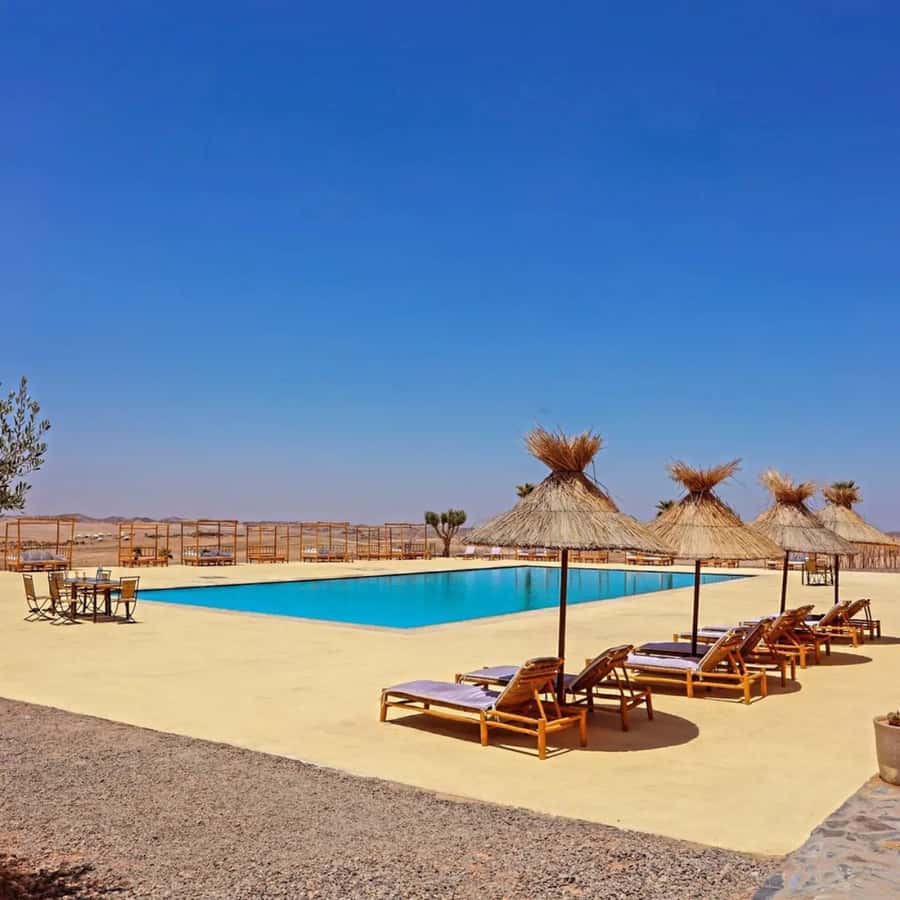Luxury Agafay Desert : Quad , Camel Ride, Pool & Dinner Show - Pool time at the camp: the luxury pause that makes it worth it