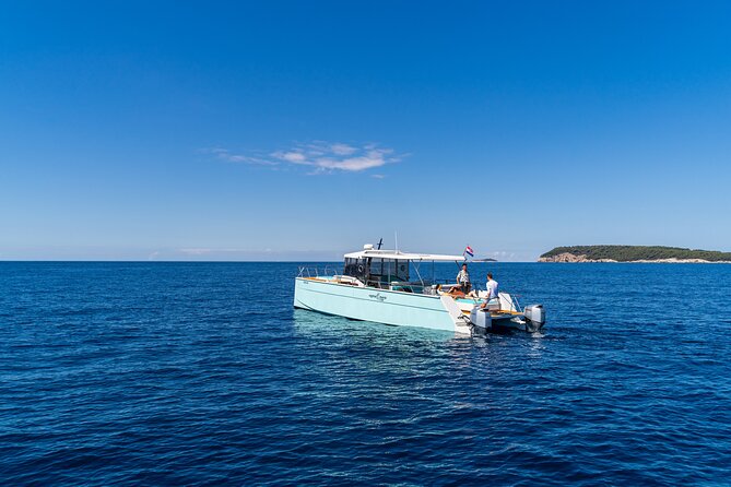 Luxury Blue Cave and Elaphiti Islands Small Group Tour - Šunj Beach on Lopud: Long Sand and the Swim-to-Shore Detail