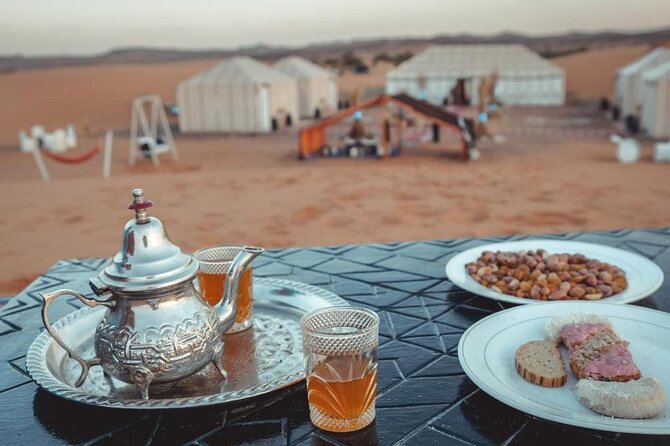 Luxury Camp in Merzouga Desert with Camel ride, Car 4WD - The desert rhythm: sandboarding, dinner, and Sahara music