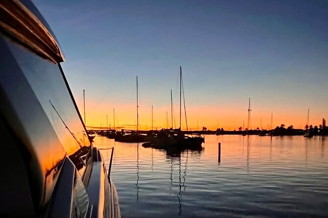 Luxury Catamaran Champagne Sunset Cruise - After dark: Charlotte Amalie harbor lights and visiting yachts