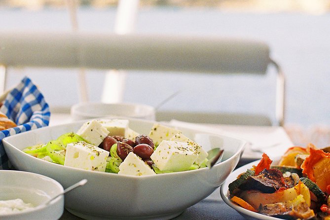 Luxury Catamaran Cruise from Athens with Traditional Greek Meal and BBQ - Two cruise vibes: morning lunch vs sunset dinner