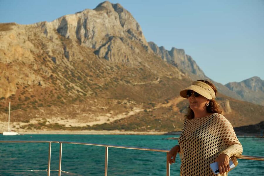 Luxury Catamaran to Balos: Sunset, Snacks, Drinks & Transfer - Balos Lagoon beach time: swimming, snorkeling, and your photo window