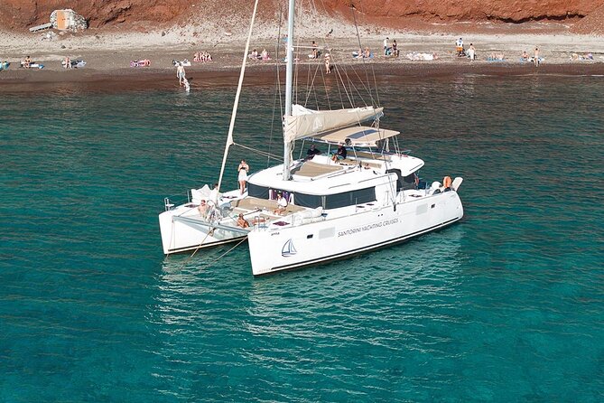 Luxury Santorini Catamaran Cruise: Lunch, BBQ, Drinks, Transfers - The sailing route: Red Beach, White Beach, Indian Rocks, and Akrotiri