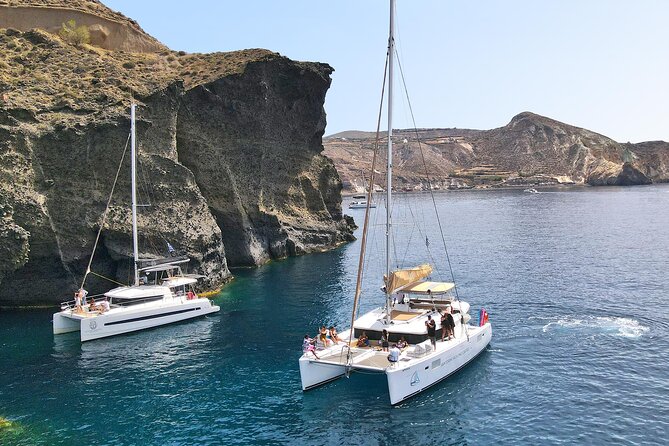 Luxury Santorini Sunset Cruise: Dinner, BBQ, Open Bar, Transfers - The sunset sail back to Vlychada: when the cruise earns its name