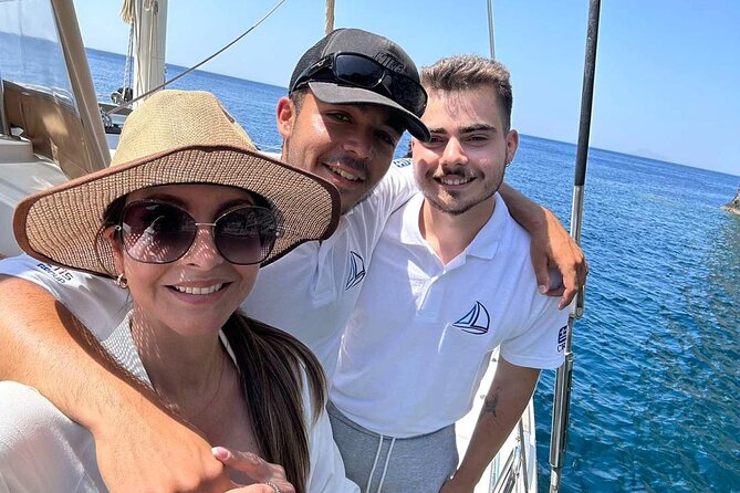 Luxury Santorini Sunset Cruise: Dinner, BBQ, Open Bar, Transfers - Sailing past Red Beach, White Beach, Indian Rocks, and Akrotiri Lighthouse
