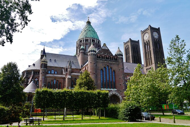 Luxury Shared Canal Tour with live guide - St. Bavo Church: spire, stained glass, and the organ by Christian Müller