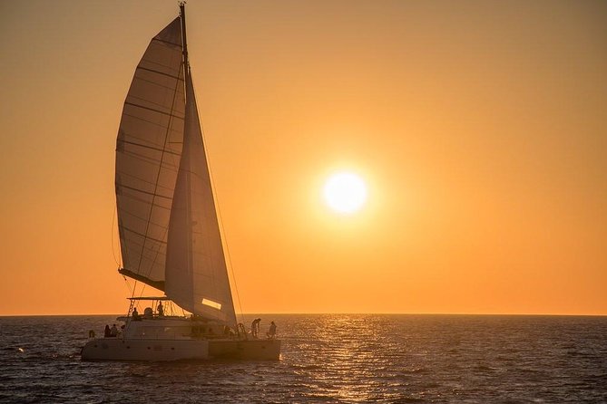 Luxury Small-Group Catamaran Cruise with BBQ, Open bar & Transfer - Red Beach Photo Opportunity: Iron Soil Color and Easy Time on Board