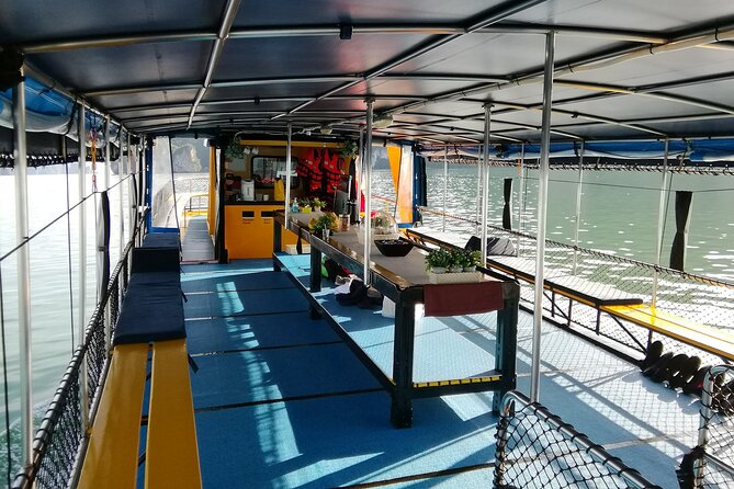 Luxury Small Group Phang Nga Bay Relaxing Sunset Cruise - Lawa Island swim and sunset return: where the day winds down