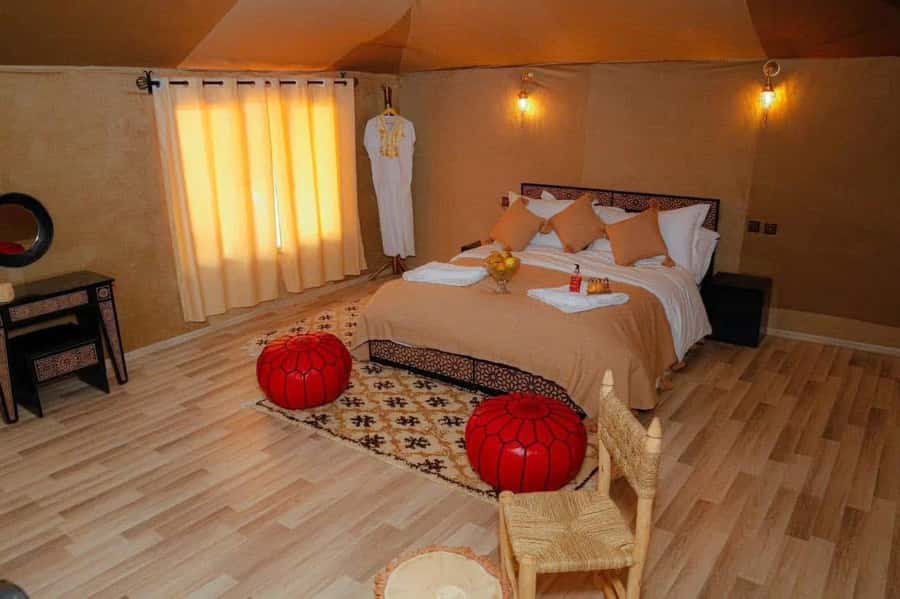 Marrakech: 3-day Exclusive Desert Luxury Tour; Quad & Camels - Erg Chebbi at Sunset and Sunrise: Sandboarding, Music, and Camp Life