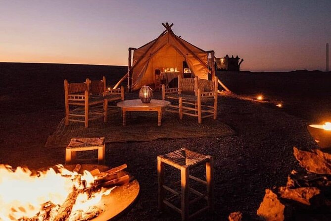 Marrakech: Camels & Quads on Sunset and Luxury Dinner with Show - Berber camp welcome: tea, traditional attire, and a cooperative stop