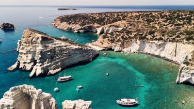 Milos: Full Day Luxury Catamaran with Full Meal & Open Bar - Boarding at Adamantas Port: Welcome Drinks and a Calm Start