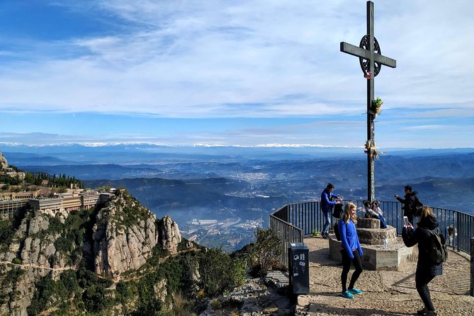 Montserrat Hiking Experience & Monastery Premium Small Group Tour - Passeig de Gràcia pickup and the van ride into mountain country