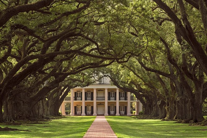 N’awlins Luxury: Laura, Oak Alley or Whitney Plantation Tour w/Transportation - Whitney Plantation: memorial focus, French Creole buildings, and first-person narratives