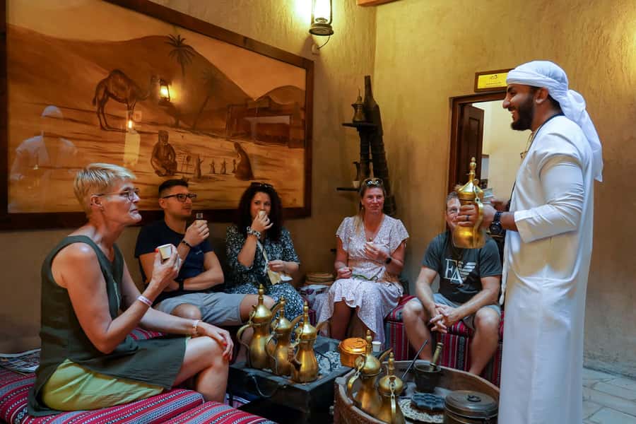 Old Dubai: Premium Guided Tour with Street Food & Abra Ride - Meeting at Al Khayma Heritage Restaurant: tea, snacks, and a quick reset