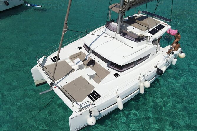 Panormo: Luxury Catamaran Cruise with Lunch & Open Bar - After Lunch: Second Swimming Round, Deck Time, and Onboard Comfort