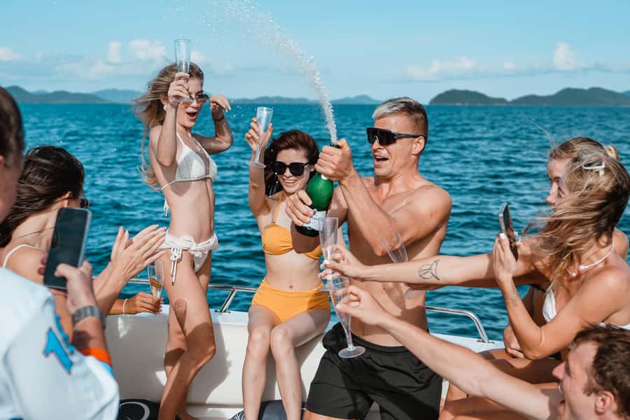 Phuket: James Bond & Phang Nga Bay by Luxury Sunset Yacht - Floating krathong moment and Naka Island beach play