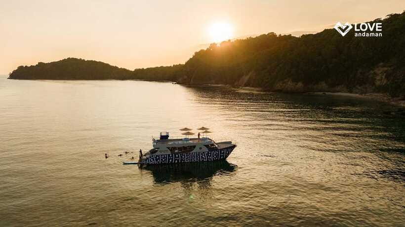 Phuket: Phi Phi Maiton Island Sunset Premium Catamaran Tour - Sunset from the whale-shark themed onboard “bar”