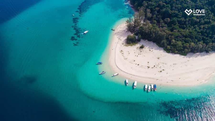 Phuket: Phi Phi Maiton Island Sunset Premium Catamaran Tour - Pickup, van ride, and that early breakfast briefing