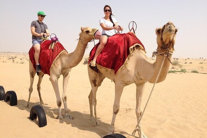 Premium Desert Safari Dubai: Desert Camping & Dune Bashing - Bedouin camp time: camel ride, henna, local dress, and shisha access