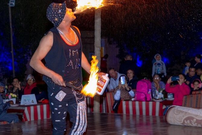 Premium Desert Safari, food Service with 4 alcoholics drinks - Henna, Arabian outfits, and photo stops: where the tour turns cultural