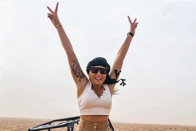 Premium Desert safari With Dune buggy camel ride BBQ dinner - Bedouin-style camp dinner and live entertainment: more than just food