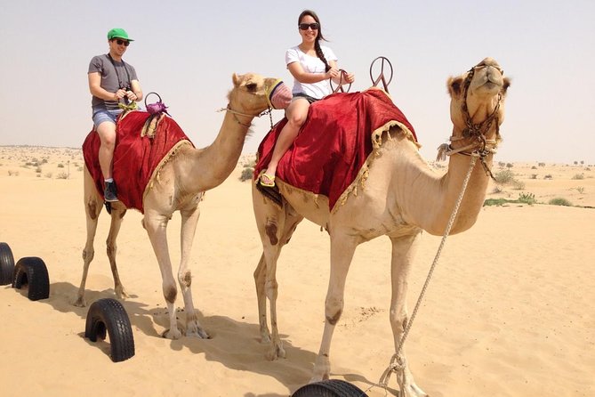 Premium Dubai Desert Safari and Quad Bike Ride - Dune bashing and sand play: the roller-coaster part