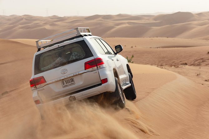 Premium Dubai Desert Safari with BBQ Dinner in the Red Dunes - Key Things to Know Before You Go