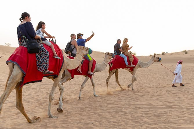 Premium Dubai Desert Safari with BBQ Dinner in the Red Dunes - Fire Blower and Belly Dancing: The Night’s Finale