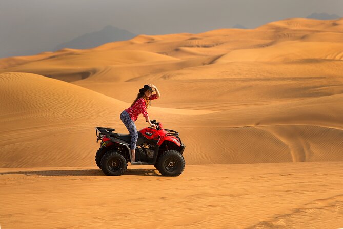 Premium Dubai Red Dunes with quadbike, camel ride and VIP Dinner - The sunset tent stop: coffee, dates, shisha, and henna