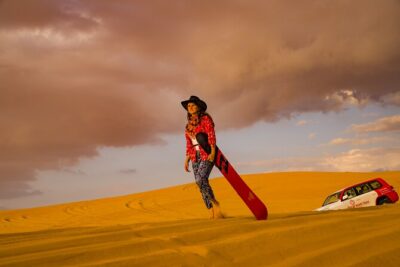 Premium Dubai Red Dunes with quadbike, camel ride and VIP Dinner - Dune bashing, quad biking, and sandboarding: more time on the sand