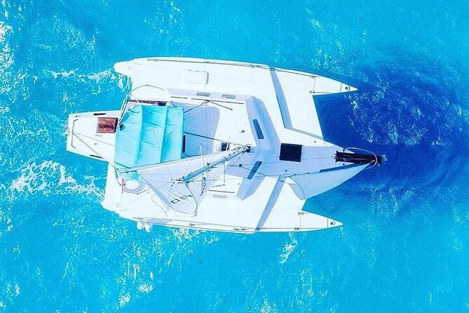 Premium Isla Mujeres Tour by Private Catamaran - Stop 1 at Playa Tortugas: check-in that actually gets you moving