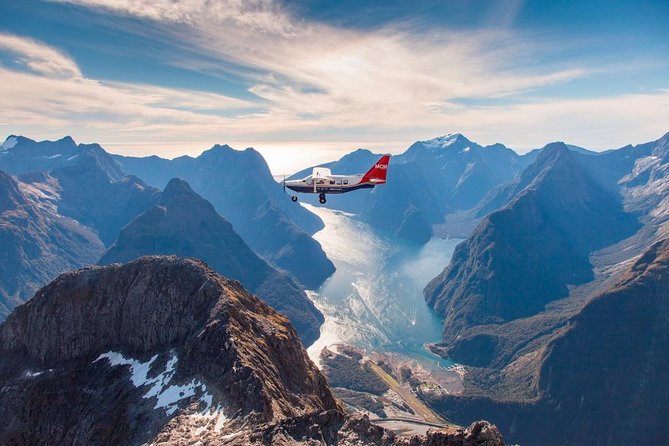Premium Milford Sound Tour Including Cruise, Flight & Lunch - Homer Tunnel to Milford Sound: the dramatic drop toward the fjord