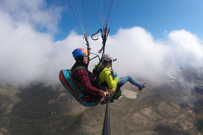 Premium Paragliding in Tenerife : Photos, videos and pickup included - Price, group size, and who this is for