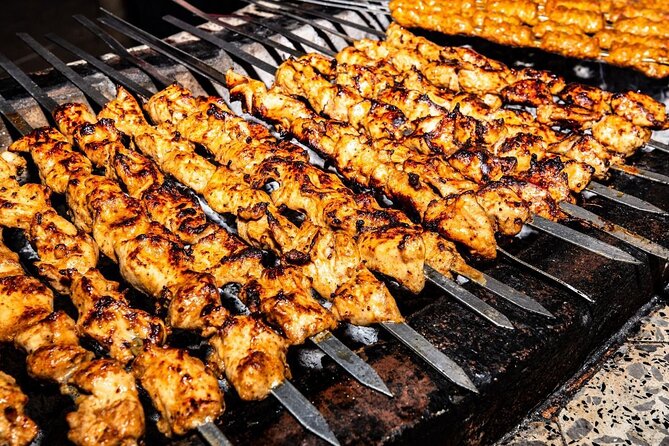 Premium Private Desert Safari with Camel Ride & Live BBQ Dinner - Live BBQ Dinner and Desert Entertainment: Belly Dance, Tanoura, Fire Shows