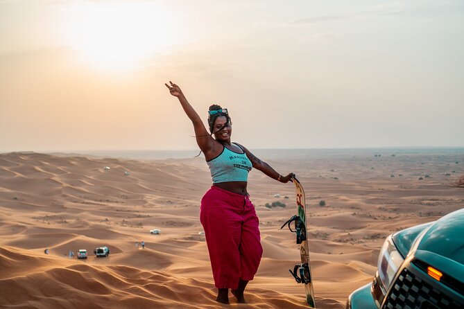 Premium Red Dune Safari with Camel Ride and BBQ in Arabian camp - Dune bashing at speed: what it feels like and how to enjoy it