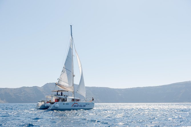 Premium Santorini Private Day Tour Elba 45, BBQ, drinks, transfer - Stop 4: Red Beach photos and a shorter swim session